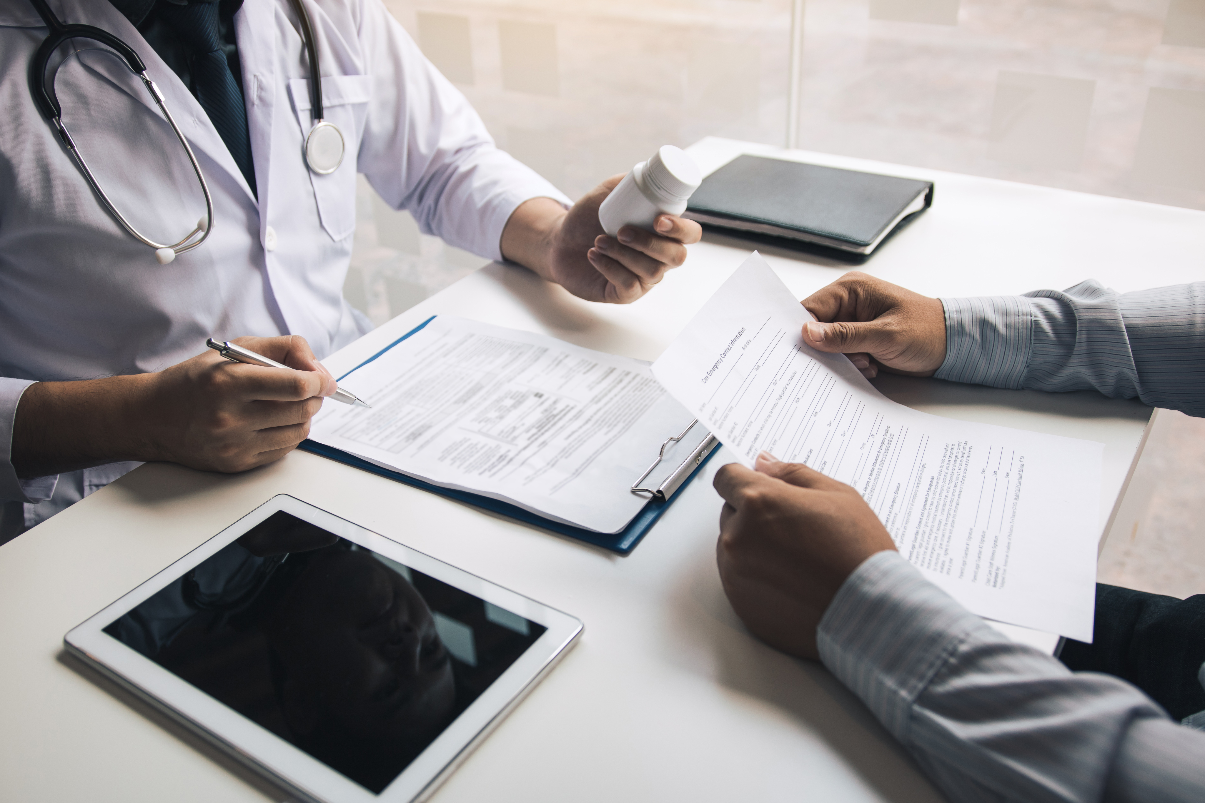 Pharmacist handling temperature-controlled medicines